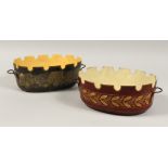 A PAIR OF REGENCY TOLEWARE TWO HANDLED BOWLS. 10ins diameter.