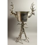 A LARGE STAG WITH COOLER on a stand. 38ins high.