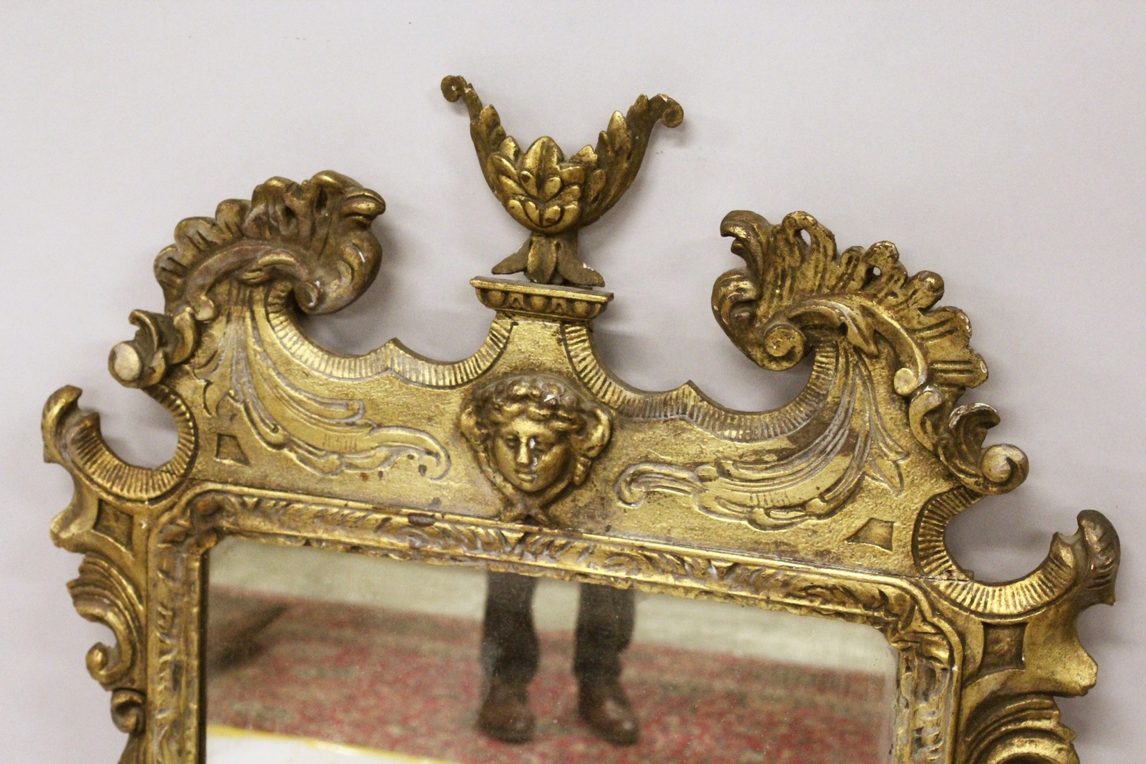A GOOD GEORGE III DESIGN CARVED WOOD AND GILDED MIRROR with acanthus scrolls, masks and urns. 3ft - Image 2 of 3