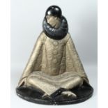 A LARGE HEAVY TERRACOTTA SEATED FIGURE in the Art Deco style on a marble base. 27ins high.