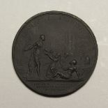 A WALKERS RARE BLACK BASALT MEDALLION PLAQUE depicting classical figures, inscribed 'Clementia