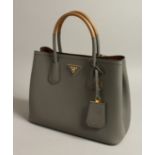 A LADIES PRADA GREY LEATHER HANDBAG