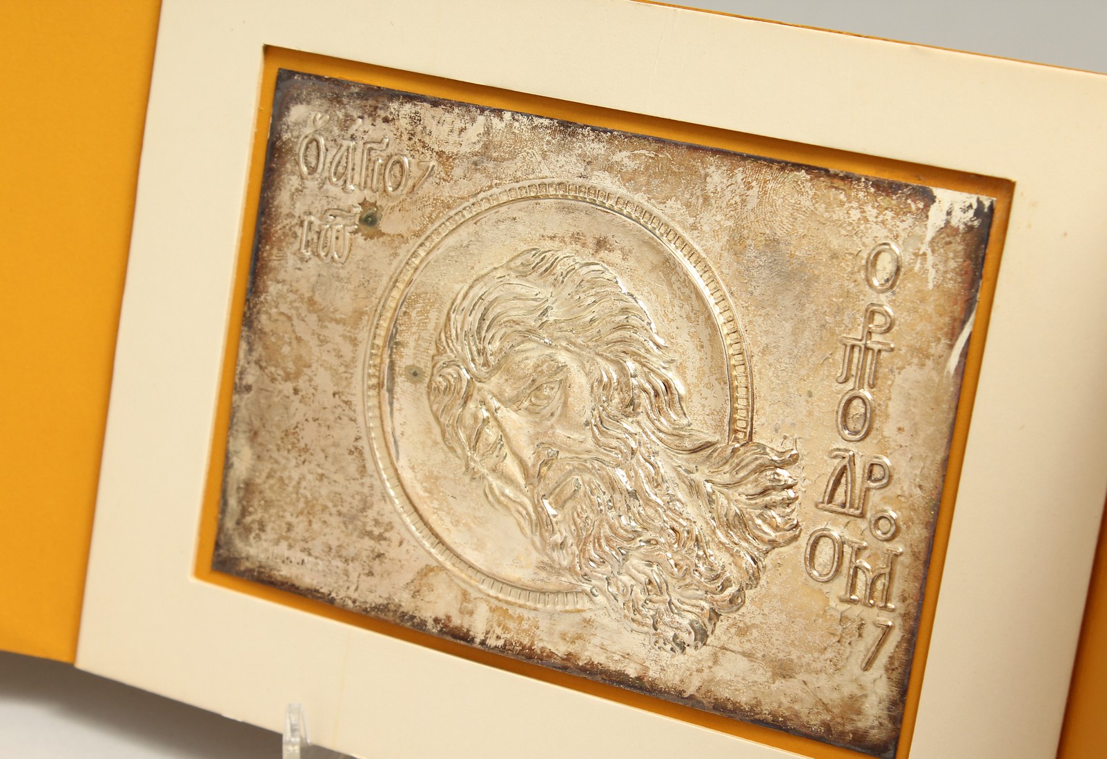 A LALAOUNIS SILVER PLAQUE in an orange card.