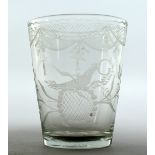 AN EARLY GLASS BEAKER engraved with birds and flowers and initial I G. 4ins high.