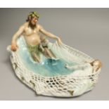 A SUPERB LARGE ART DECO MEISSEN PORCELAIN DISH as NEPTUNE pulling a fishing net with cupid and nymph