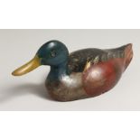 A PAINTED WOODEN DECOY DUCK, 12.5ins long.