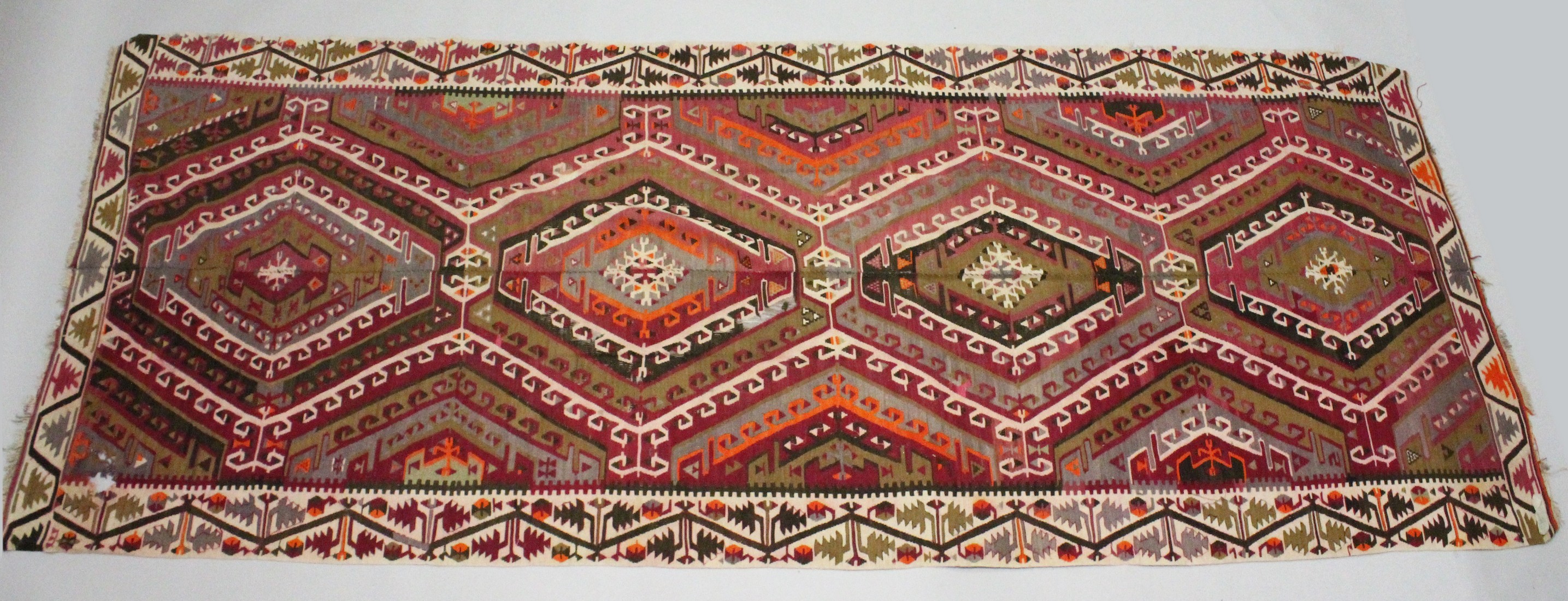 A TURKISH KELIM CARPET, with central join, pink ground with four large medallions. 12ft 6ins x 5ft. - Image 4 of 7