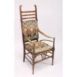 A GOOD LIBERTY RUSTIC ARM CHAIR with Liberty print padded back and seat.
