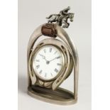 AN EDWARDIAN JOCKEY CLOCK. 10ins high.