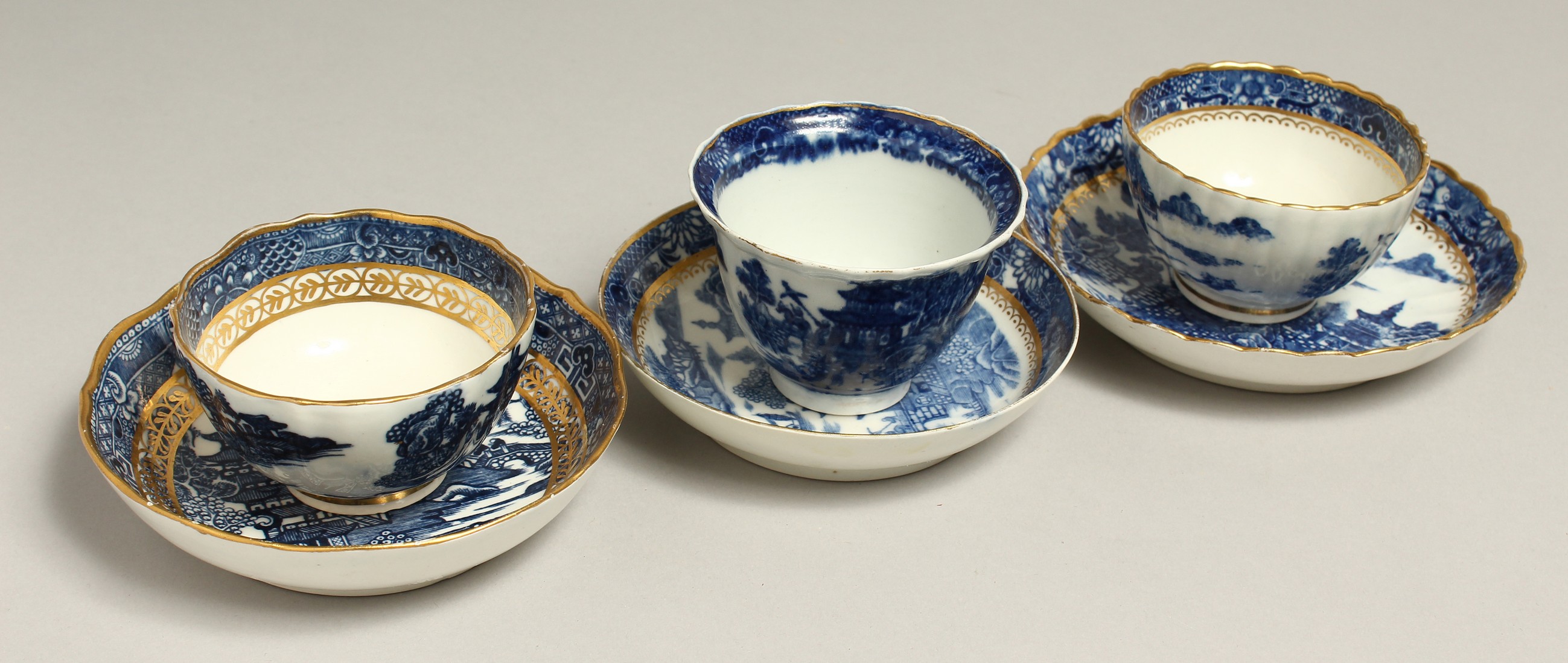 AN 18TH CENTURY CAUGHLEY PORCELAIN PAGODA TEA BOWL AND SAUCER, two Temple tea bowls and saucers, two