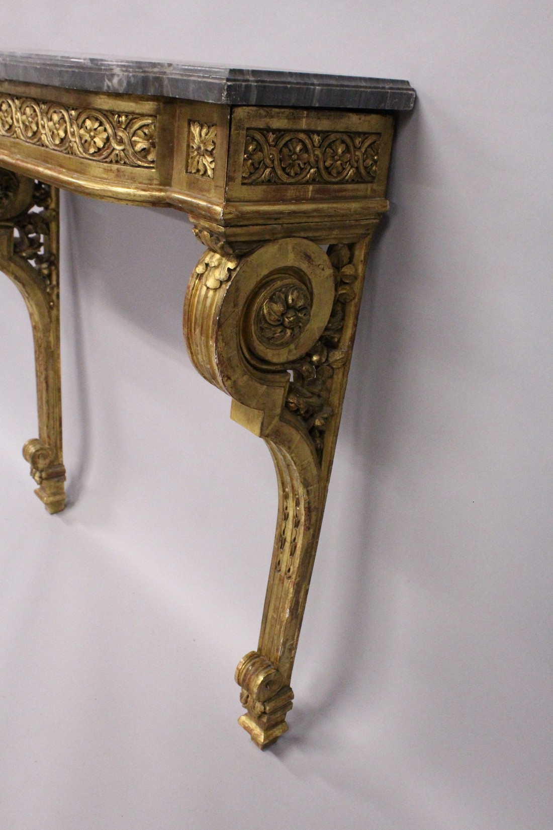 A GOOD 19TH CENTRUY MARBLE AND CARVED GILTWOOD CONSOLE TABLE with a bow fronted top, floral and - Image 4 of 6