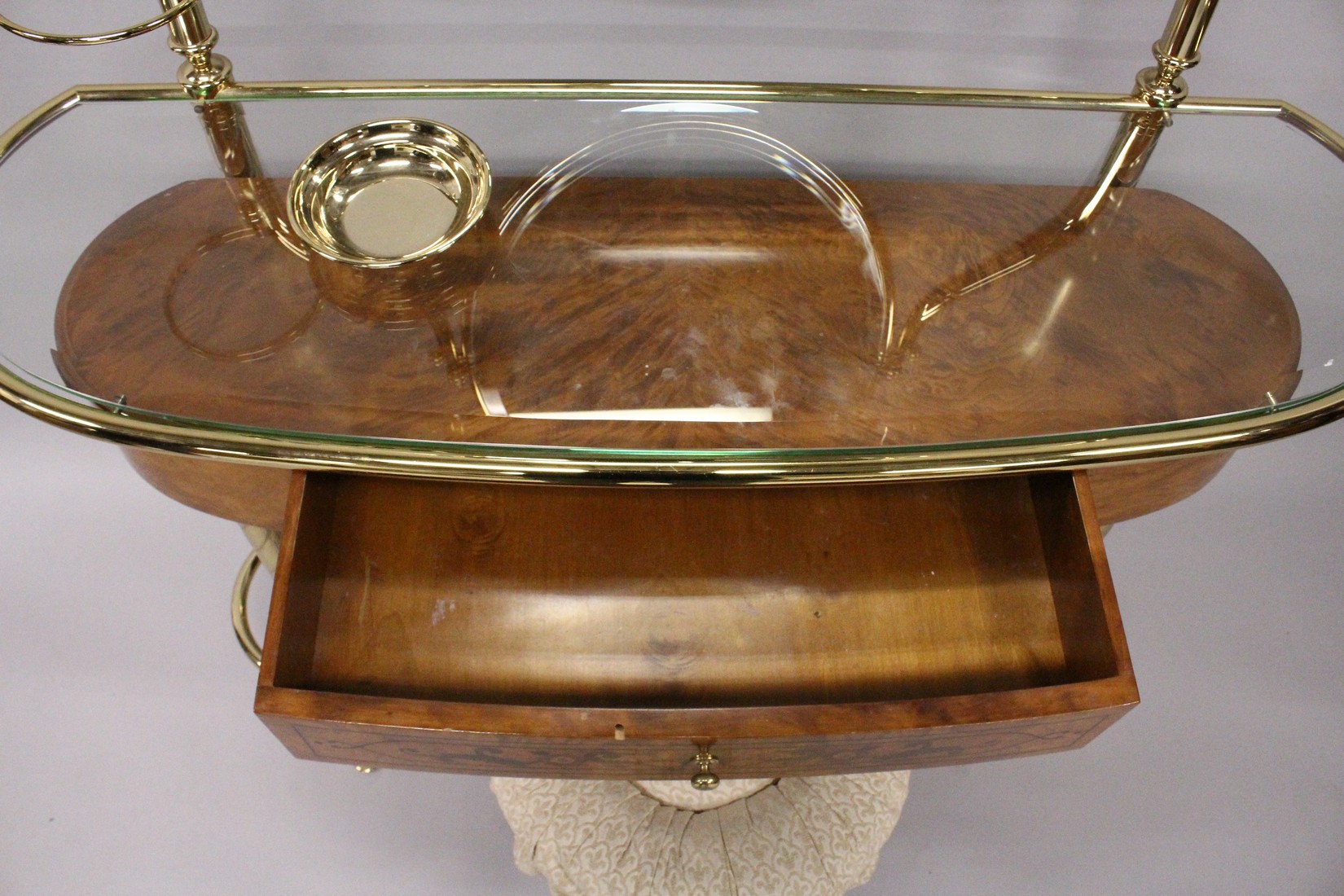 A STYLISH BURRWOOD, BRASS AND GLASS DRESSING TABLE, 20th Century with an oval mirror, bevelled glass - Image 2 of 4