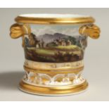 AN EARLY 19TH CENTURY HERCULANEUM CACHE POT AND STNAD painted with a fine continuous landscape