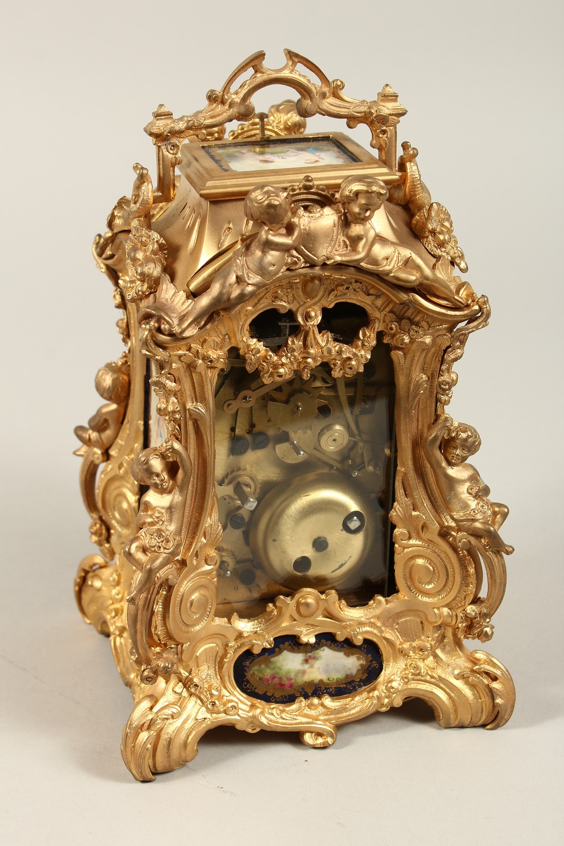 A LARGE LOUIS XVITH STYLE SEVRES ORMOLLU CLOCK with painted porcelain panels, cupid mounts and - Bild 3 aus 7