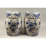 A PAIR OF BLUE AND WHITE PORCELAIN BARREL SEATS 17ins high.