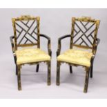 A GOOD PAIR OF CHINESE DESIGN LACQUERED CHAIRS with cross rail splats and padded seats.