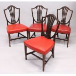 A SET OF FOUR HEPPLEWHITE MAHOGANY SHIELD BACK SINGLE CHAIRS with leather seats.