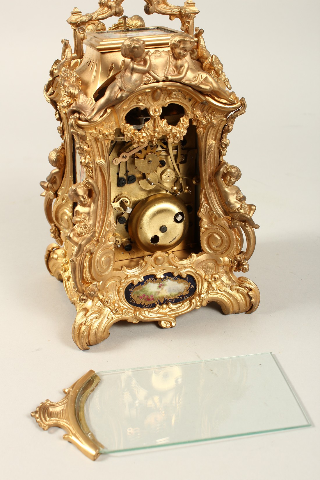 A LARGE LOUIS XVITH STYLE SEVRES ORMOLLU CLOCK with painted porcelain panels, cupid mounts and - Bild 4 aus 7