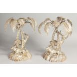 A GOOD PAIR OF PLATE BAMBOO AND DEER ORNAMENTS. Two deer beneath palm trees. 9ins high