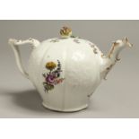 A GOOD MEISSEN BULLET SHAPED TEAPOT, CIRCA.1820, with flowers in relief and painted with flowers.