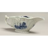 A SAMPSON BLUE AND WHITE 18TH CENTURY WORCESTER STYLE SAUCEBOAT. 7ins long.