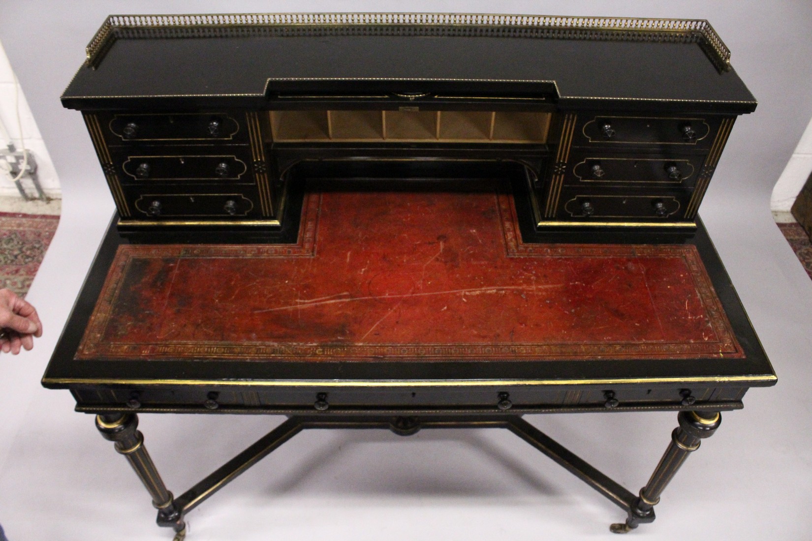 GILLOW & CO. AN EBONISED AND PARCEL GILDED WRITING DESK, the brass galleried upper section fitted - Image 3 of 7