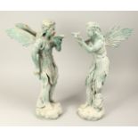 A PAIR OF BRONZE FAIRIES 20ins high.