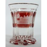 A GOOD BOHEMIAN GOBLET with engraved buildings on a ruby background. 4ins high.