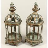 A PAIR OF METAL AND GLASS LANTERNS