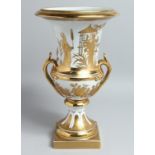 A PARIS WHITE AND GOLD TWO HANDLED URN SHAPED VASE on a square base. 15ins high.
