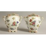A PAIR OF MEISSEN DESIGN PORCELAIN TWO HANDLED VASES. 7ins high.