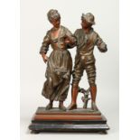 A 19TH CENTURY CONTINENTAL SPELTER GROUP OF A YOUNG LADY AND YOUNG MAN on a rectangular base.