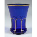 A GOOD BLUE GLASS GOBLET with gilt decoration. 4ins high