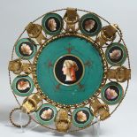 A GOOD 19TH CENTURY ITALIAN CIRCULAR GILT METAL DISH, inset with eight porcelain portraits. 13ins