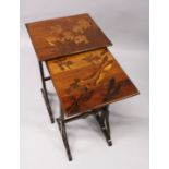 A NEST OF TWO GALLE MARQUETRY TABLES, the larger inlaid with lilies, the smaller with dragonflies.