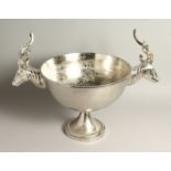 A CIRCULAR PEDESTAL WINE COOLER with stag handles 13ins diameter.