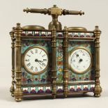 A DOUBLE BRASS AND CLOISONNE ENAMEL CLOCK