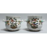 A GOOD PAIR OF DRESDEN PORCELAIN TWO HANDLED CACHE POTS painted and encrusted with birds and flowers