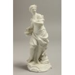A LATE 18TH CENTURY / EARLY 19TH CENTURY MEISSEN BISCUIT FIGURE OF A GIRL with a basket, standing
