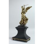 A 19TH CENTURY GILT BRONZE FIGURE OF A WINGED FIGURE, probably St. Michael. standing on an