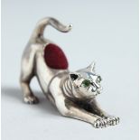 A CAST SILVER CAT PIN CUSHION.