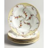 A SET OF FIVE 19TH CENTURY MEISSEN PLATES painted with garlands Cross swords mark in blue 9ins