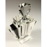 A GOOD ART DECO DESIGN CLEAR AND BLACK GLASS SCENT BOTTLE AND STOPPER.