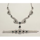 A SUPERB 18CT WHITE GOLD, DIAMOND AND SAPPHIRE NECKLACE AND BRACELET, set with fifteen sapphires