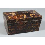 A FAUX TORTOISESHELL TWO DIVISION TEA CADDY 9.5ins high.