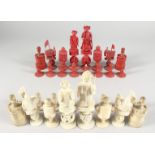 A GOOD MIXED SET OF CHINESE AND ENGLISH, CARVED AND STAINED IVORY/BONE CHESS PIECES. (32).