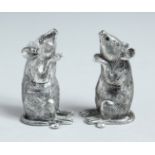 A PAIR OF .800 MICE SALT AND PEPPERS