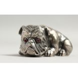 A RUSSIAN SILVER DOG with blue eyes Faberge mark, Head 84 I.P. 2.5ins long.