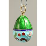 A RUSSIAN SILVER AND ENAMEL EGG PENDANT.