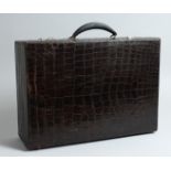 A CROCODILE SUITCASE 16.5ins long x 11.5ins deep x 5ins high